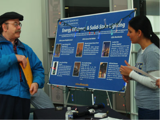 Prof. Shahedipour-Sandvik speaks to a visitor at CNSE Community Day