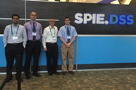 Professor Carpenter's Research Group next to the SPIE logo
